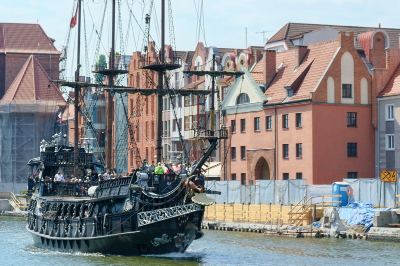 19 - A replica pirate ship cruising on the Motława River in the historic Old Town of Gdańsk, Poland